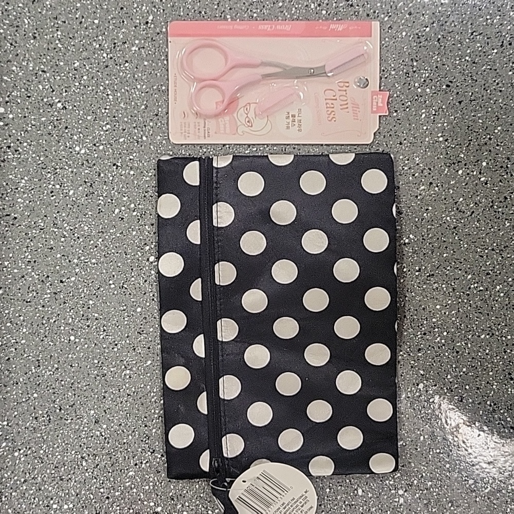 Makeup bag and eyebrow cutter